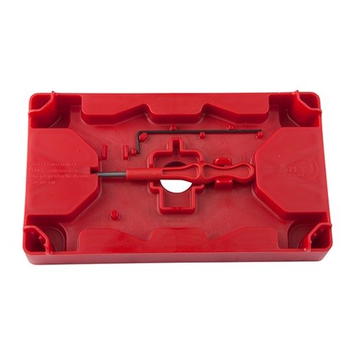Le POLYMER ARMORER'S BLOCK & TOOLING PLATE facilite le travail sur les pistolets en polymère, avec des bosses ajustables et des surfaces protégées.