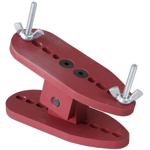 Le UNIVERSAL FITTING FIXTURE de GRACO te permet de fixer solidement les GraCoil et autres plaques de crosse tout en évitant la surchauffe lors de la découpe.